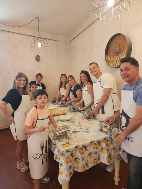 Milan: Pasta and Tiramisu Cooking Class with Wine - The final meal, sauces, and wine