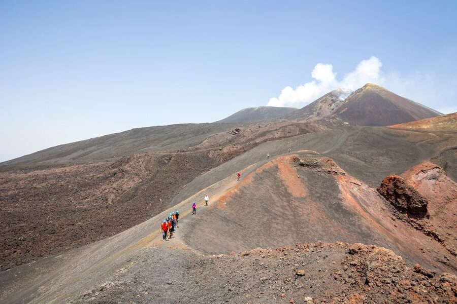 Mount Etna: Guided Volcano Summit Hiking Tour with Cable Car - Entering a lava channel and moving toward the summit