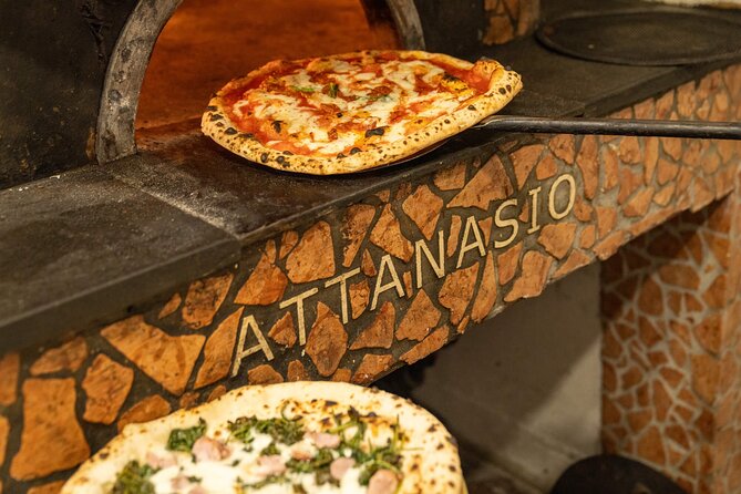 Naples Pizza & Drinks Tour: A Slice of Naples with Eating Europe - Starting under Port’Alba at Libreria Berisio