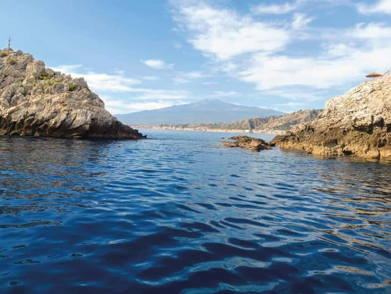Naxos: Isola Bella, Blue Grotto, & Mazzarò Bay Boat Tour - Capo Taormina and the Faraglioni rocks
