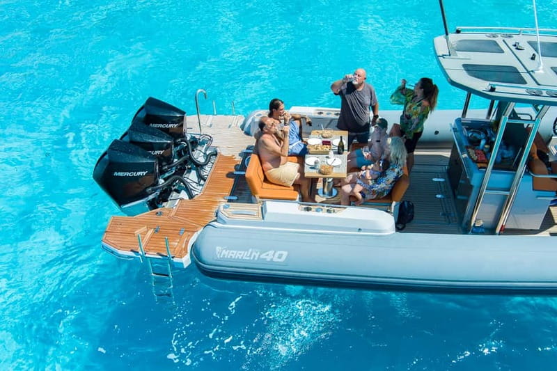 Olbia: Boat tour to Tavolara Park with Aperitif and Drinks - Spiaggia del Dottore: the first swim