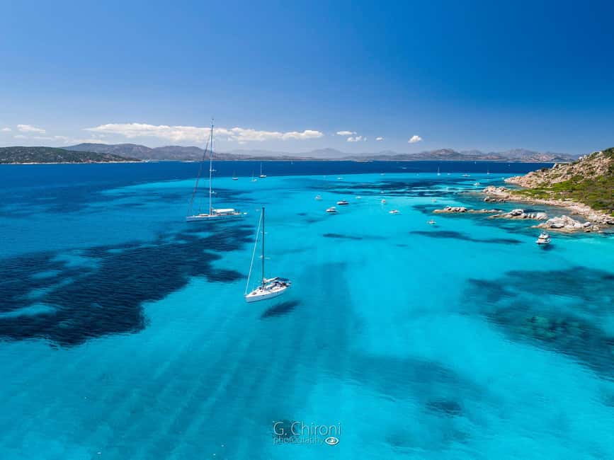 Olbia: Dolphin Watching & Snorkeling Boat Tour near Figarolo - Cala Moresca: swimming, snorkeling, and the Sardinian aperitif