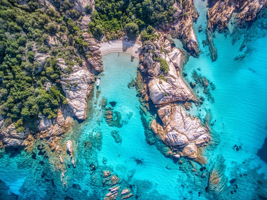 Olbia: Tavolara and Molara Snorkeling Boat Tour - Tavolara’s cliffs from the water