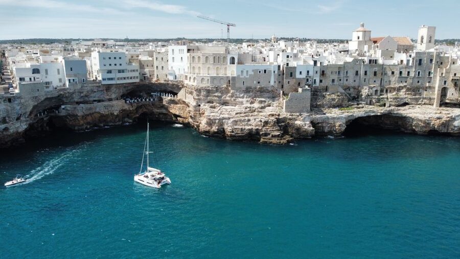 Polignano a Mare: Catamaran Tour with Aperitif & Local Food - Cala Corvino: 50 minutes for swimming and paddleboards