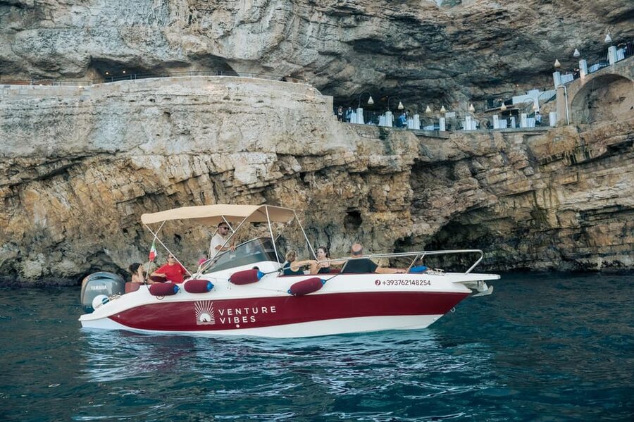 Polignano Sea Caves: Boat Tour with Snorkeling & Aperitif - The first caves: blue light and nesting swallows