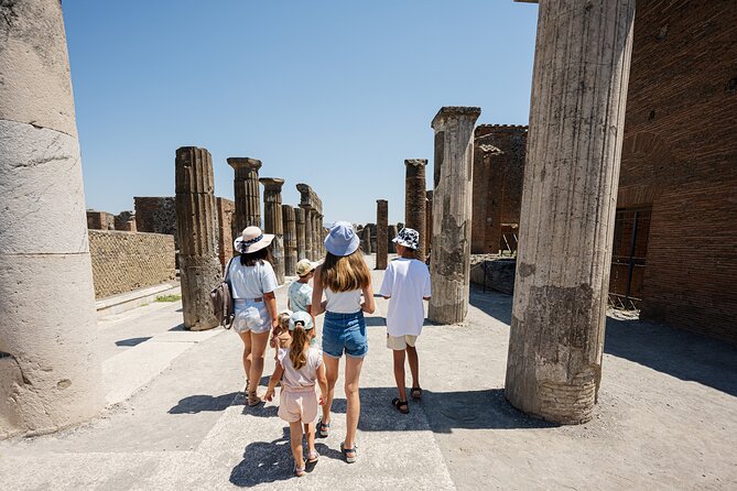 Pompeii and Mount Vesuvius Day Trip from Rome with Pizza Lunch - Pompeii: Roman streets under Vesuvius
