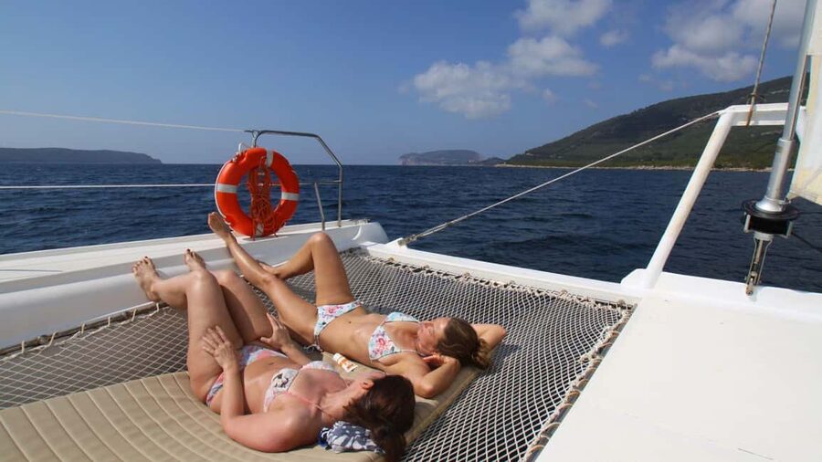 Porto Conte: Half-day catamaran tour with aperitif - Sardinian sausage, pecorino, and white wine