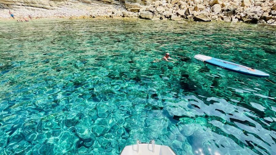 Porto Conte: Half-day catamaran tour with aperitif - What the $91 price really covers