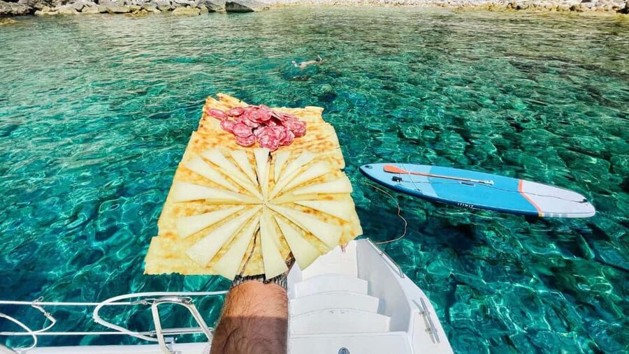 Porto Conte: Half-day catamaran tour with aperitif - Who will enjoy this trip most