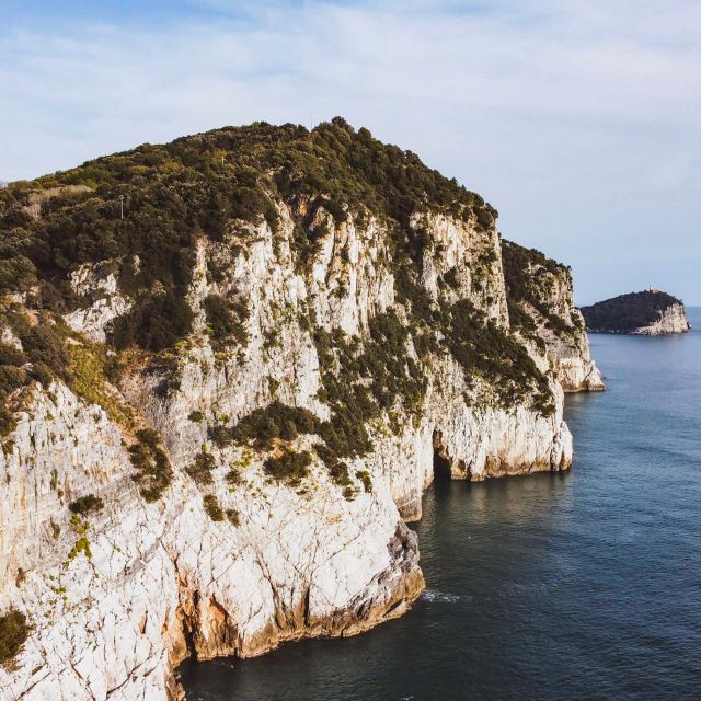 Portovenere: Isola Palmaria, Tino, and Tinetto Boat Tour - Tino and Tinetto: lighthouses, ruins, and a small island world