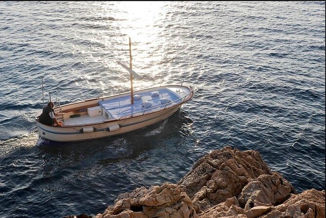 Private tour in a typical Capri boat - Captains, conversation, and photographs