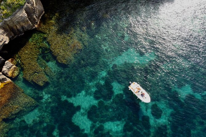 Procida Island Tour by Boat 2h 15m with Swimming and Underwater Photos - Pozzovecchio Bay and the beach from Il Postino