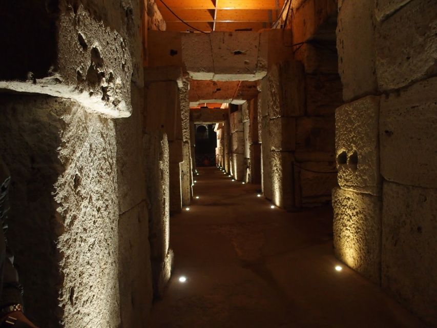 Rome: Ancient History and Colosseum Underground Tour - Walking across the arena floor