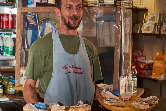 Rome: Award Winning Trastevere Group Food Tour with Wine - La Norcineria di Iacozzilli brings out the porchetta