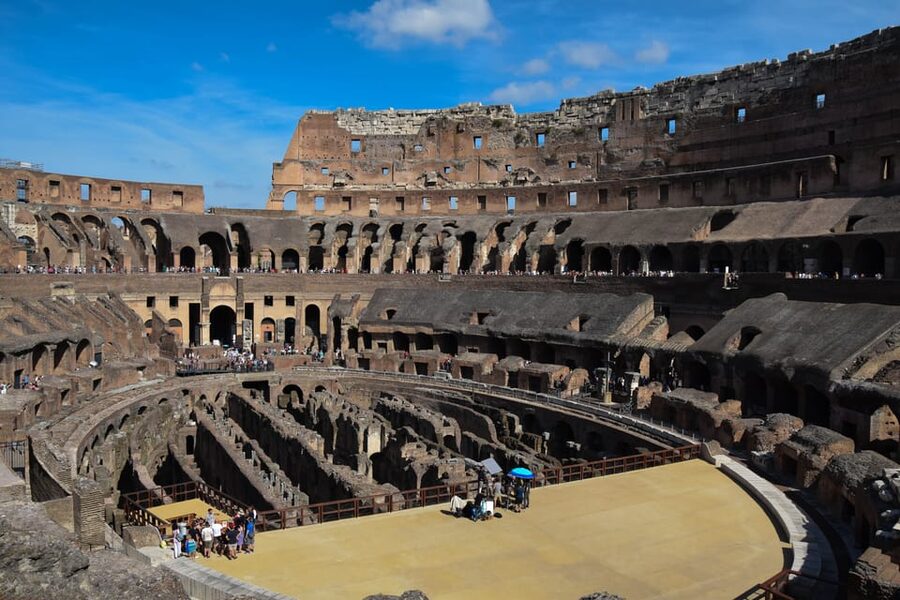 Rome: Colosseum Experience with Audio Guide and Arena Option - Finding Crown Tours above the Colosseo Metro Station