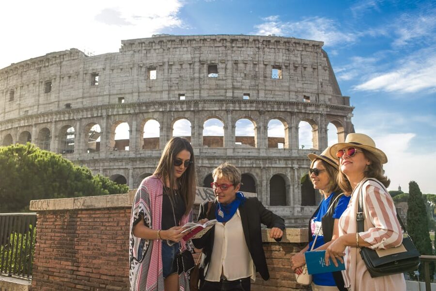 Rome: Colosseum Experience with Host and Audio Guide - Walking through the Roman Forum