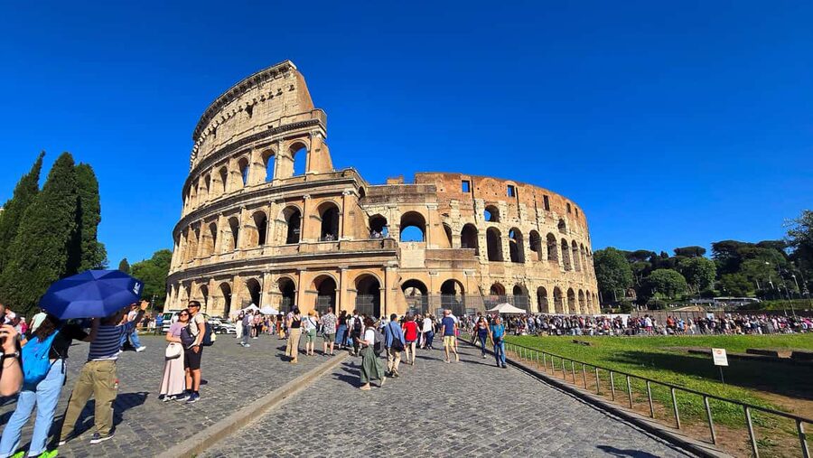 Rome: Colosseum Express Tour and Roman Forum Access - Entering the Colosseum with a guide