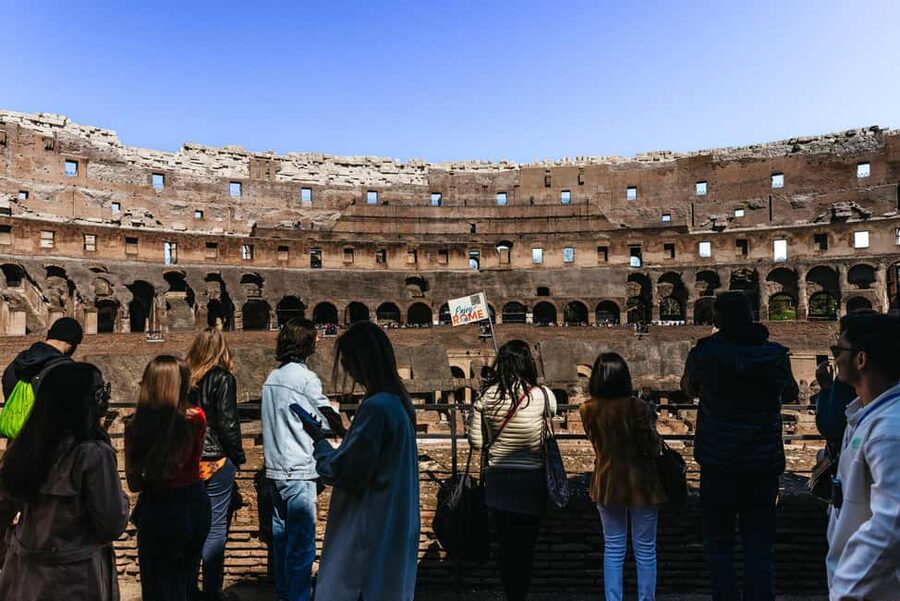 Rome: Colosseum, Forum & Palatine Hill Tour & Optional Arena - Entering the Colosseum through the gladiators’ gate
