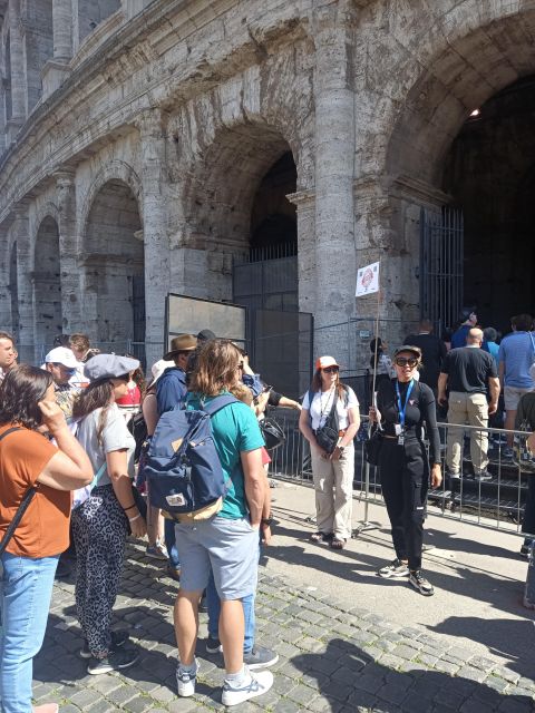 Rome: Colosseum, Palatine Hill, & Roman Forum Walking Tour - Walking through the Roman Forum