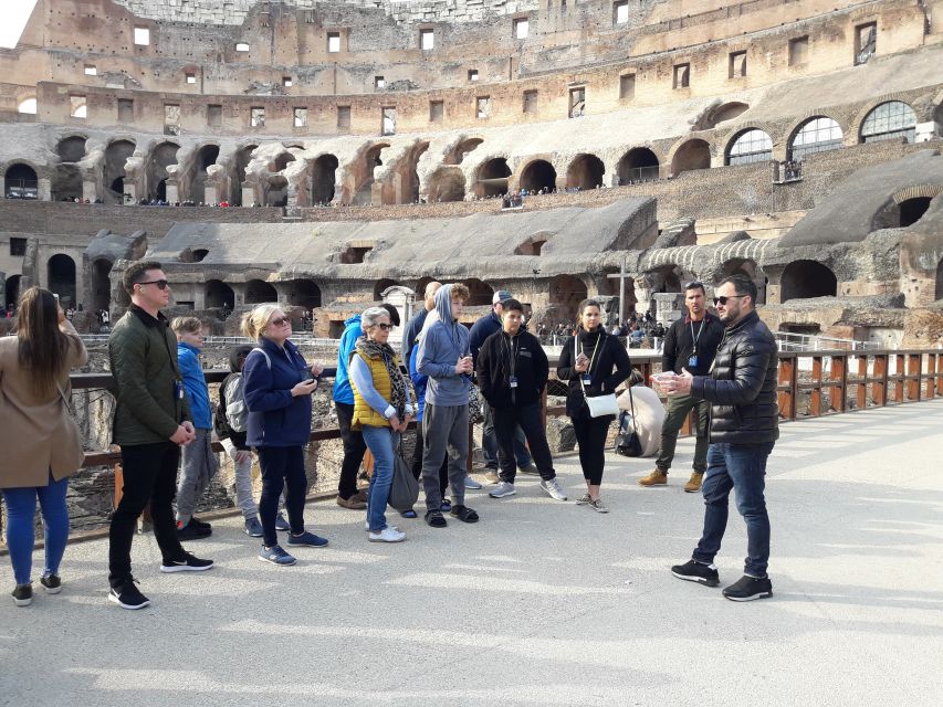 Rome: Colosseum Underground Small Group Guided Tour - Standing on the Colosseum arena floor