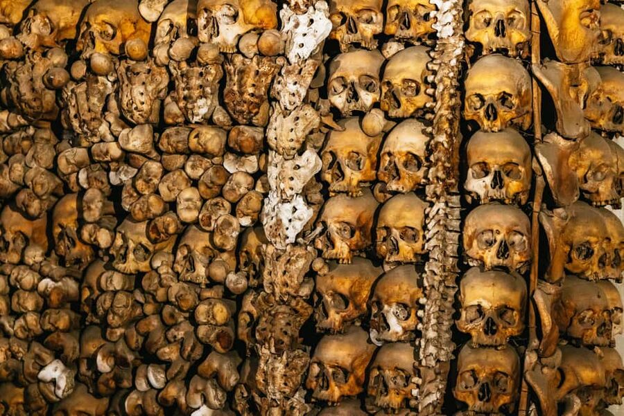 Rome: Crypts and Catacombs Underground Tour with Transfers - Walking through the ancient catacombs
