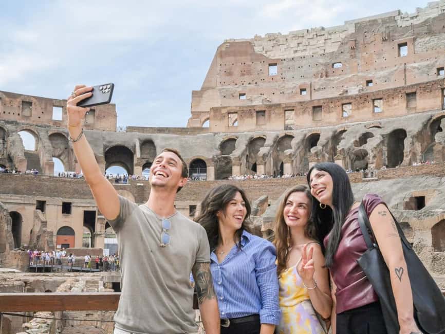 Rome: Full-Day Colosseum, Vatican Museums & City Center Tour - Piazza Venezia and the walk toward ancient Rome