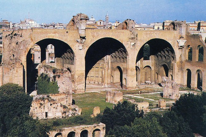 Rome: Guided Group Tour of Colosseum, Roman Forum & Palatine Hill - Walking through the Roman Forum