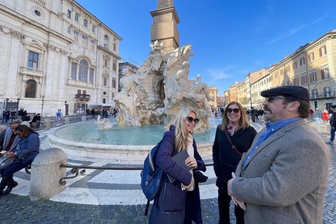 Rome in a Day Group Tour with Vatican Museums and Colosseum - Walking through the Roman Forum