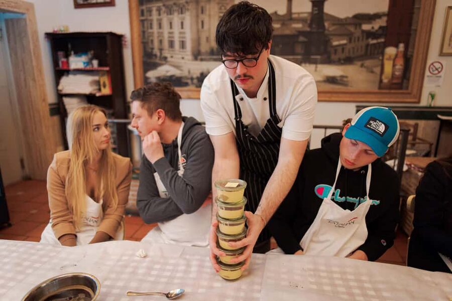 Rome: Pizza and Tiramisu Cooking Class in Piazza Navona - Sitting down to eat what you made