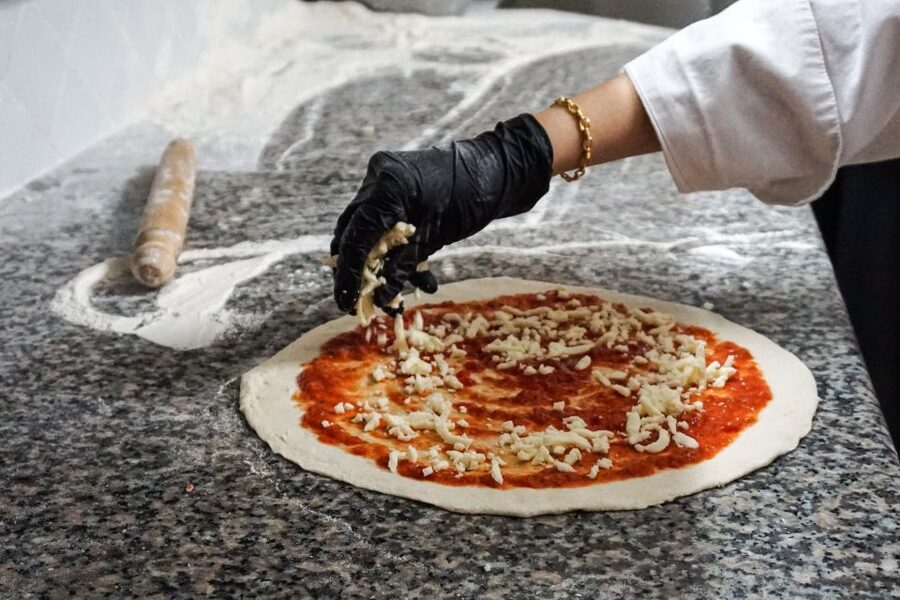 Rome: Pizza and Tiramisu Cooking Class in Piazza Navona - What the chefs add to the experience