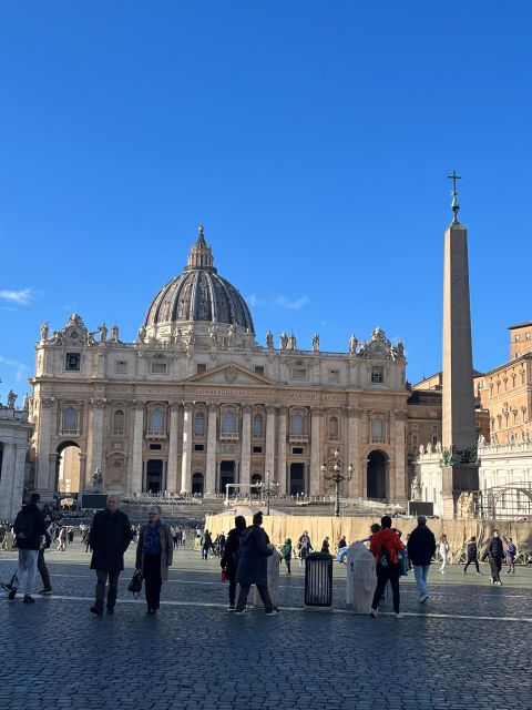 Rome: St. Peter's Basilica and Papal Grottoes Guided Tour - Inside the basilica, scale becomes the story