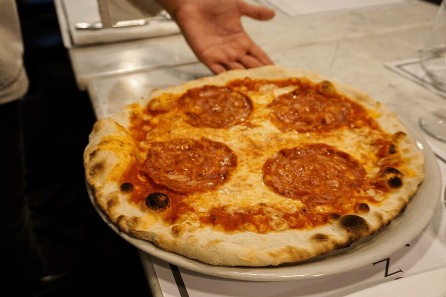 Rome: Traditional Pizza Cooking Class near Piazza Navona - From dough to the hot oven