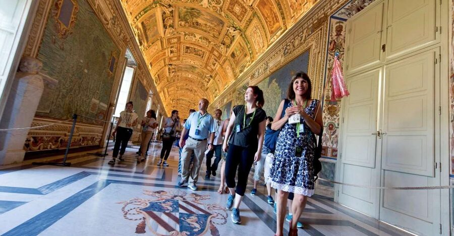 Rome: Vatican City Highlights Tour with Skip-the-Line Entry - Inside the Vatican Museums: statues, maps, and grand rooms