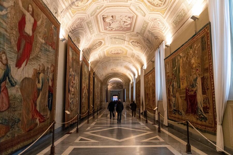 Rome: Vatican Museums, Sistine Chapel, and Basilica Tour - Painted walls in the textile gallery