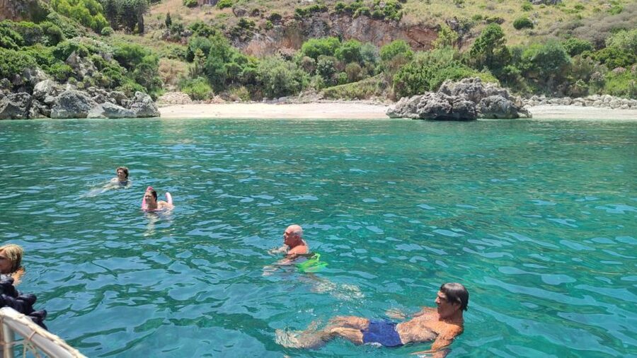 San Vito Lo Capo: Boat Trip with 3 Swimming Stops and Snacks - Local food, wine, and a very Sicilian pause