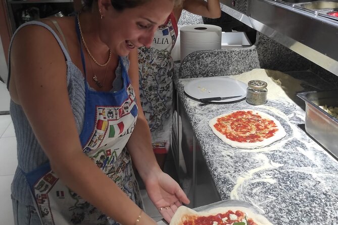 Semi-Private Pizza Making Experience in Naples with Drink - Eating Your Pizza With a Drink