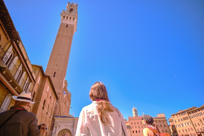 Siena, San Gimignano and Chianti Wines Day Tour from Florence - Chianti wine, snacks, and the final ride