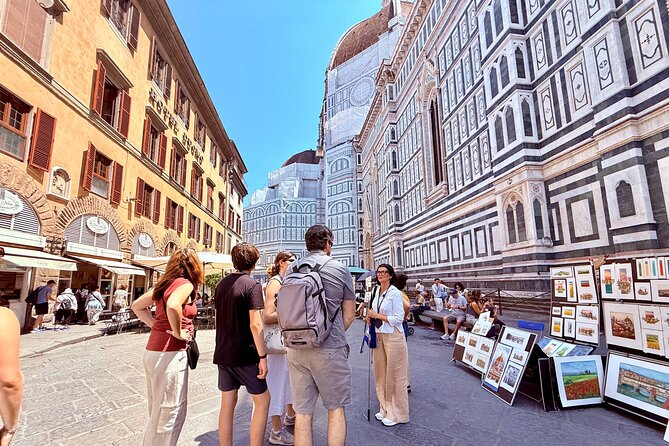 Skip the line: Uffizi and Accademia Small Group Walking Tour - Reading Florence outside the Duomo
