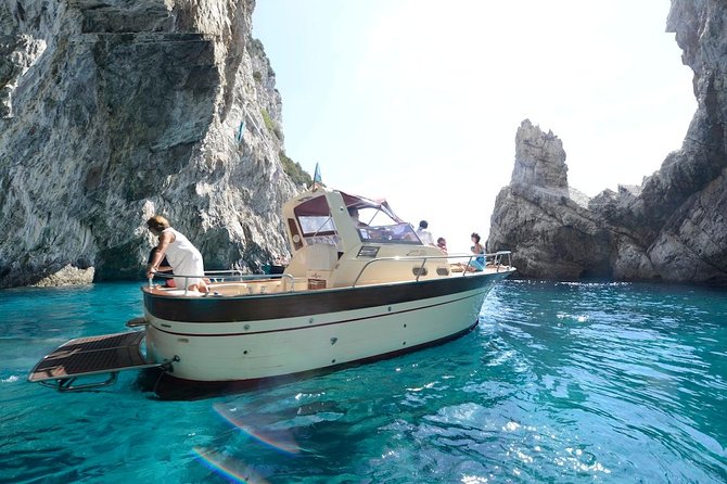 Small Group Capri Island Boat Ride with Swimming and Limoncello - The Natural Arch and Villa Malaparte