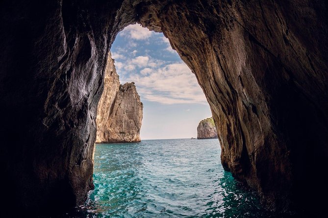 Small Group Capri Island Boat Ride with Swimming and Limoncello - The White Grotto and the first coastal views
