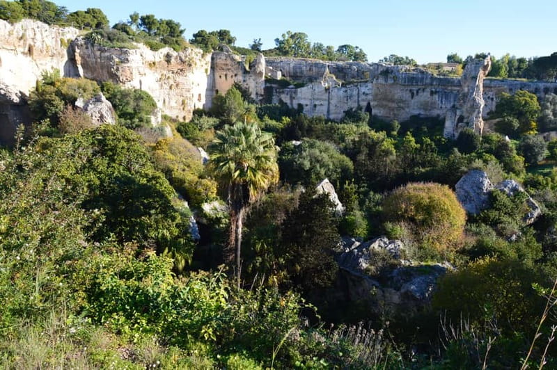 Syracuse: Ortigia and Neapolis Guided Walking Tour - The Roman Amphitheater and Syracuse’s changing rulers