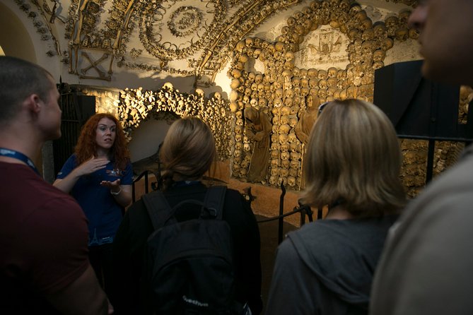 The Original Roman Crypts and Catacombs Tour with Transfers - Entering the Domitilla Catacombs