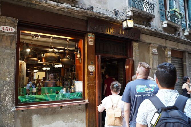 Venice Like a Local: Food, Wine & Spritz Tour with Traghetto Ride - Rialto Market flavors and the first pours