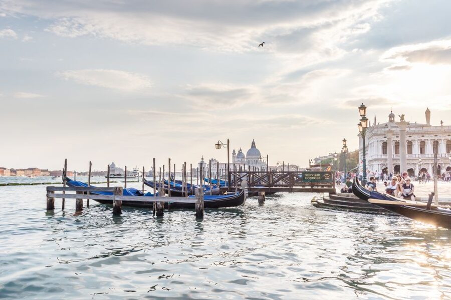 Venice: Traditional Shared Gondola Ride - Boarding a traditional Venetian gondola