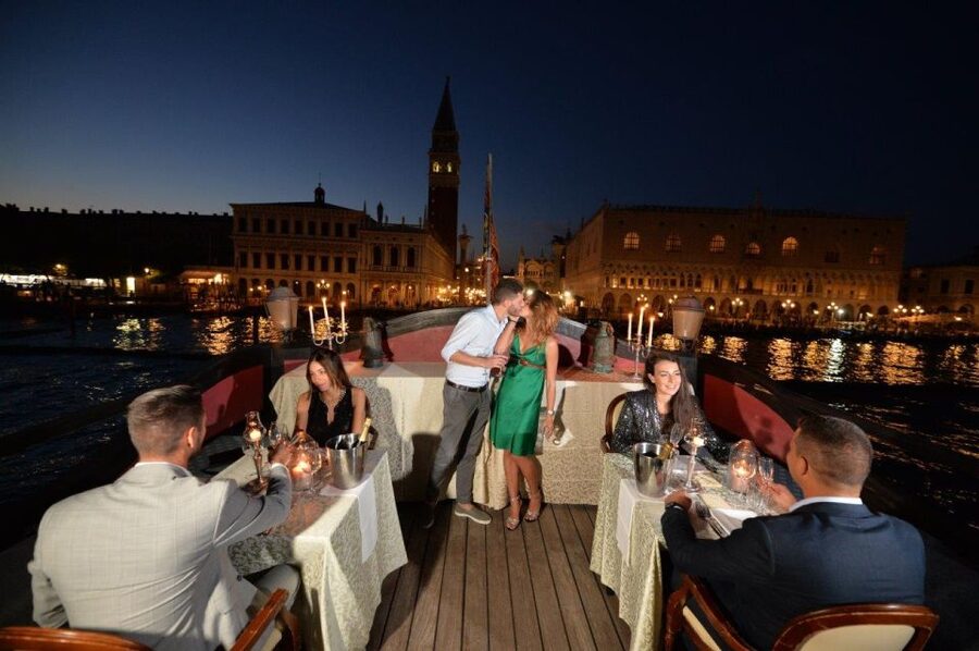 Venice: Venetian Lagoon Tour and Galleon Dinner - Circling colorful Burano