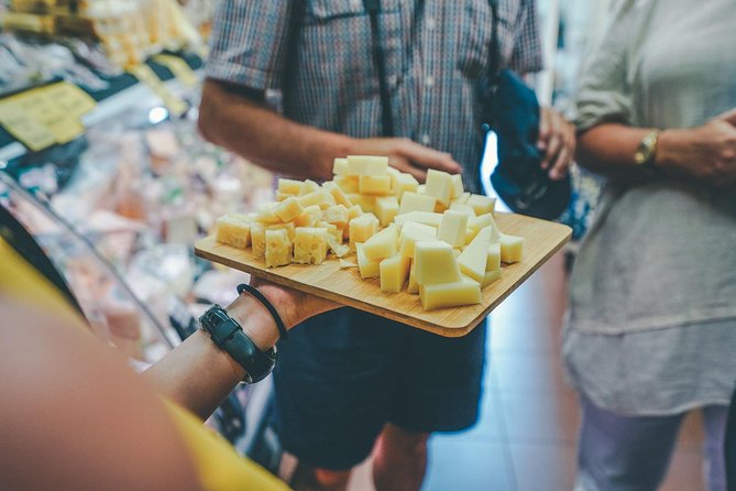 Verona All in one: Food Walking Tour, Lunch & Wine - Porta Borsari leads to Amarone risotto