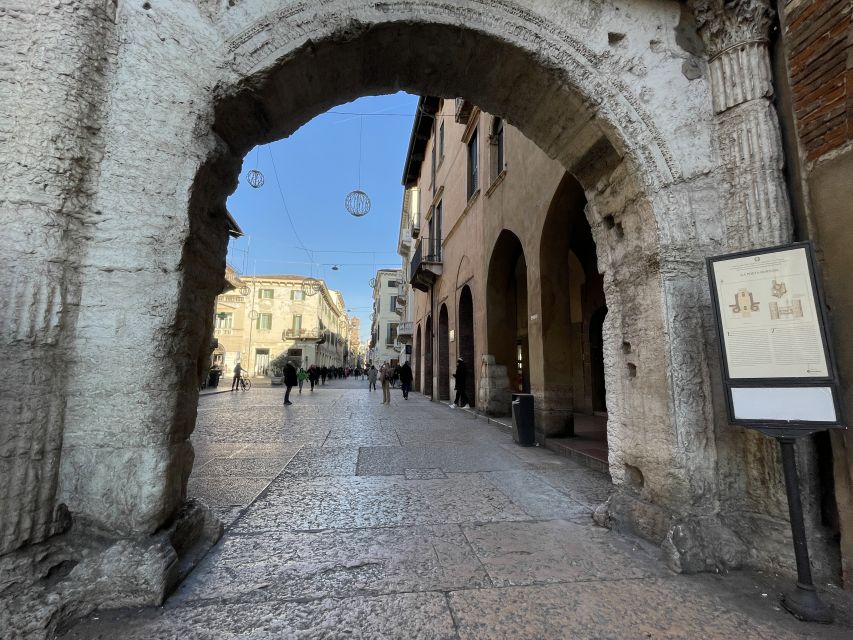 Verona: Small Group Guided Walking Tour with Arena Tickets - Piazza delle Erbe and Verona’s everyday center